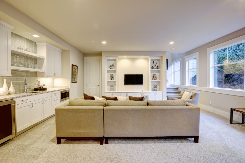 Chic,Basement,Features,A,Gray,Sectional,Facing,A,White,Built-in